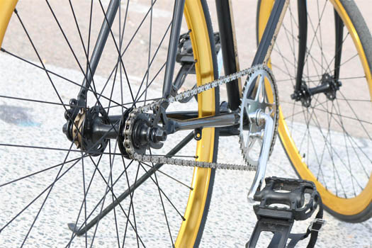 Close-up of a bicycle showing wheel spokes