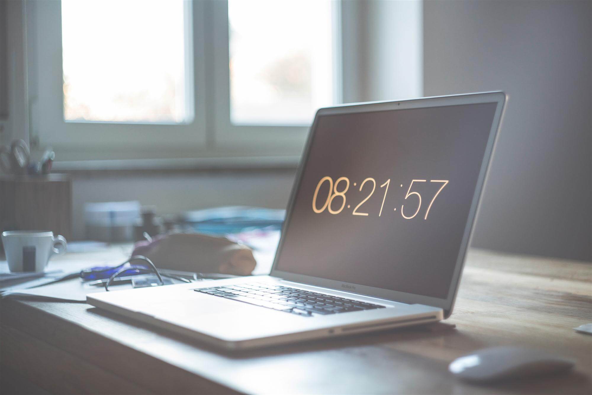 Laptop screen showing employee time tracking timer