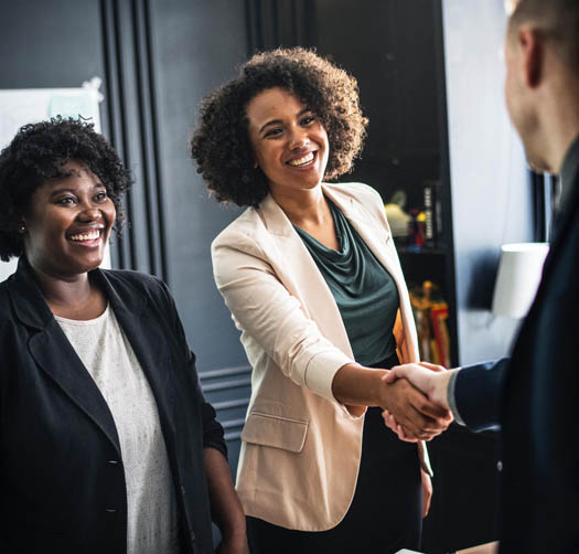 Business people shaking hands over business valuation