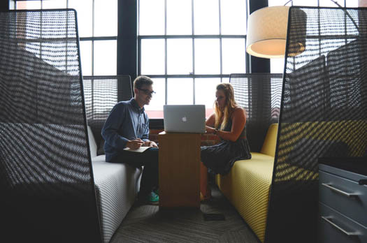 Two business people collaborating in a business relationship